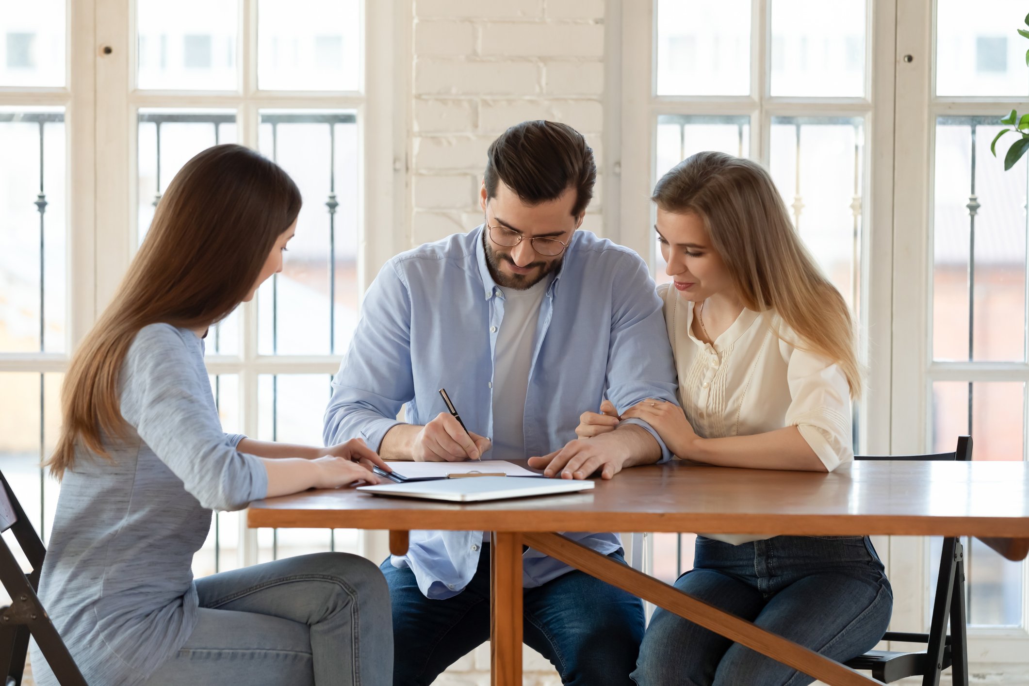 couple signing a contract