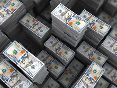 stacks of 100 dollar bills