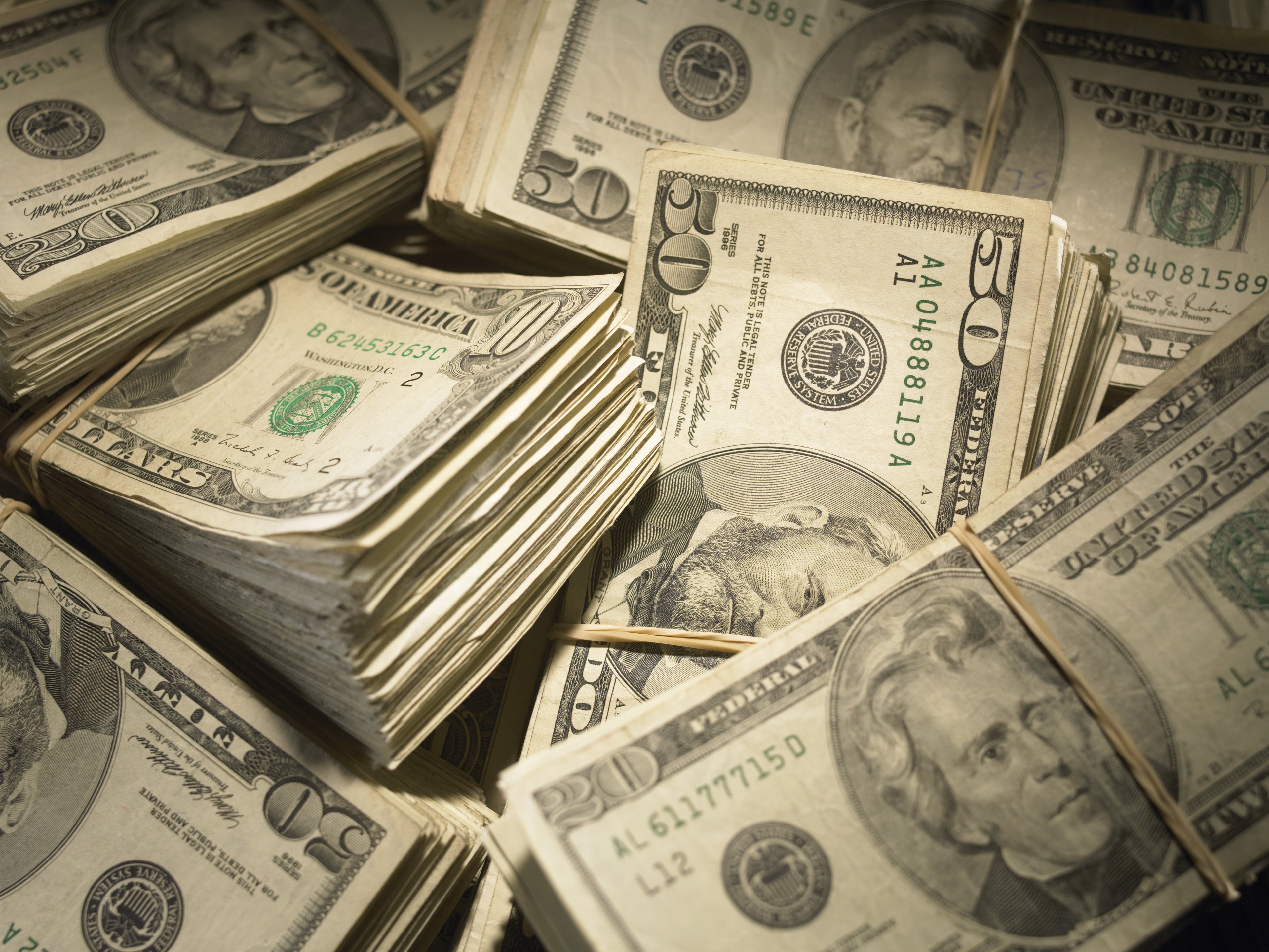 Large pile of assorted bills.jpg