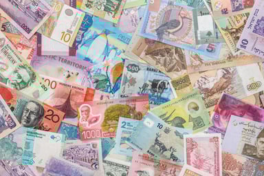 Pile of international currencies.
