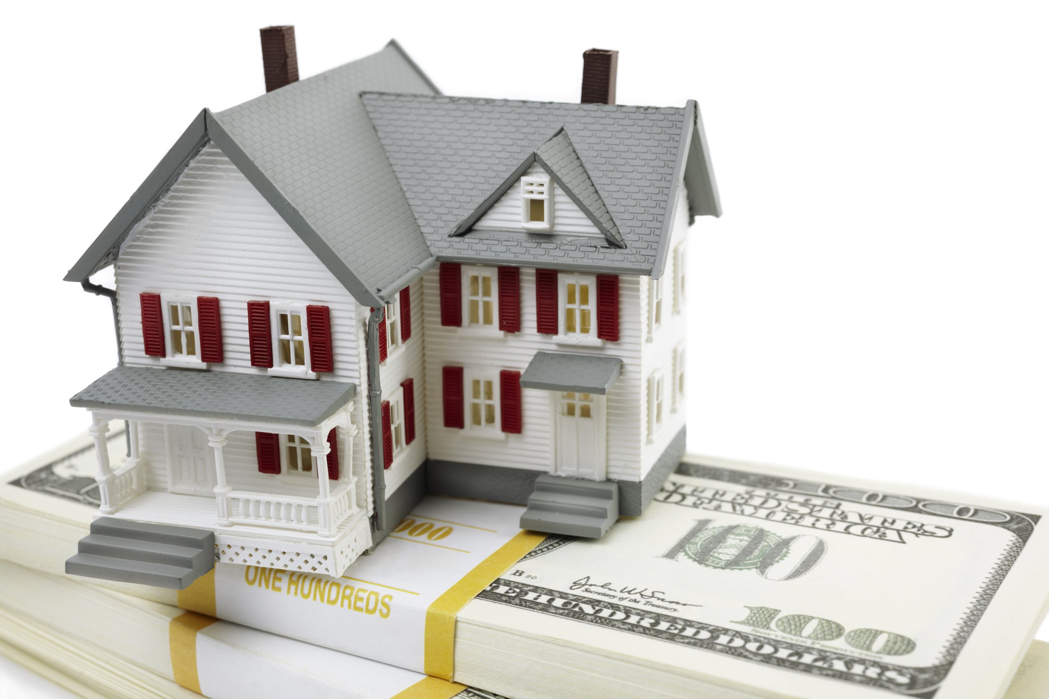 Model of house on $100 bills