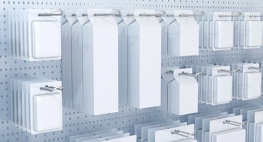 Unspecified white consumer goods hanging on shelves