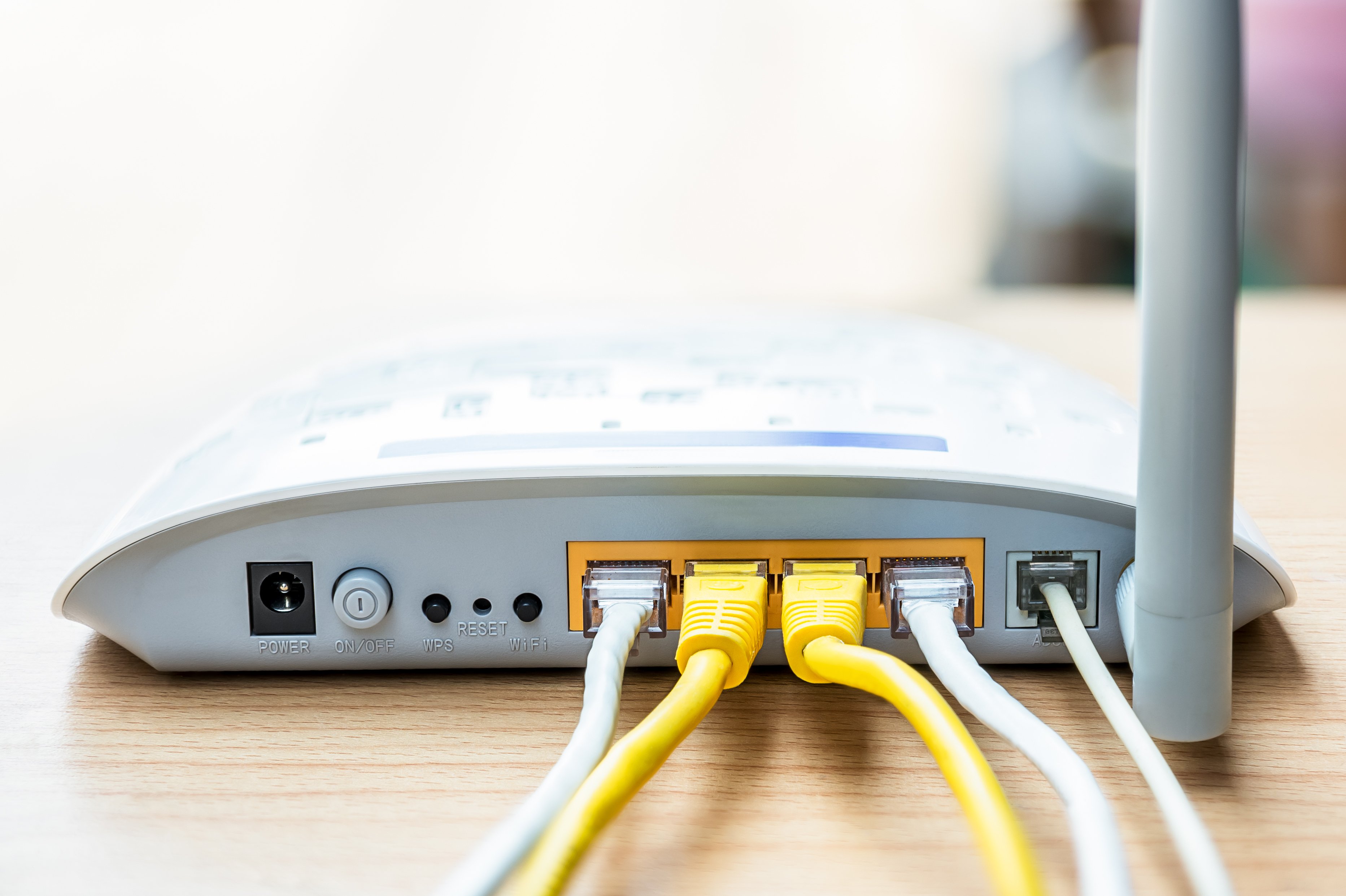 An internet modem with cables attached