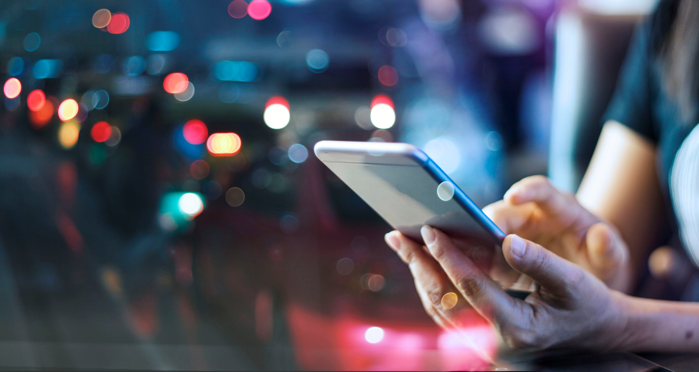 Person looking at a fintech payment app on a smartphone.