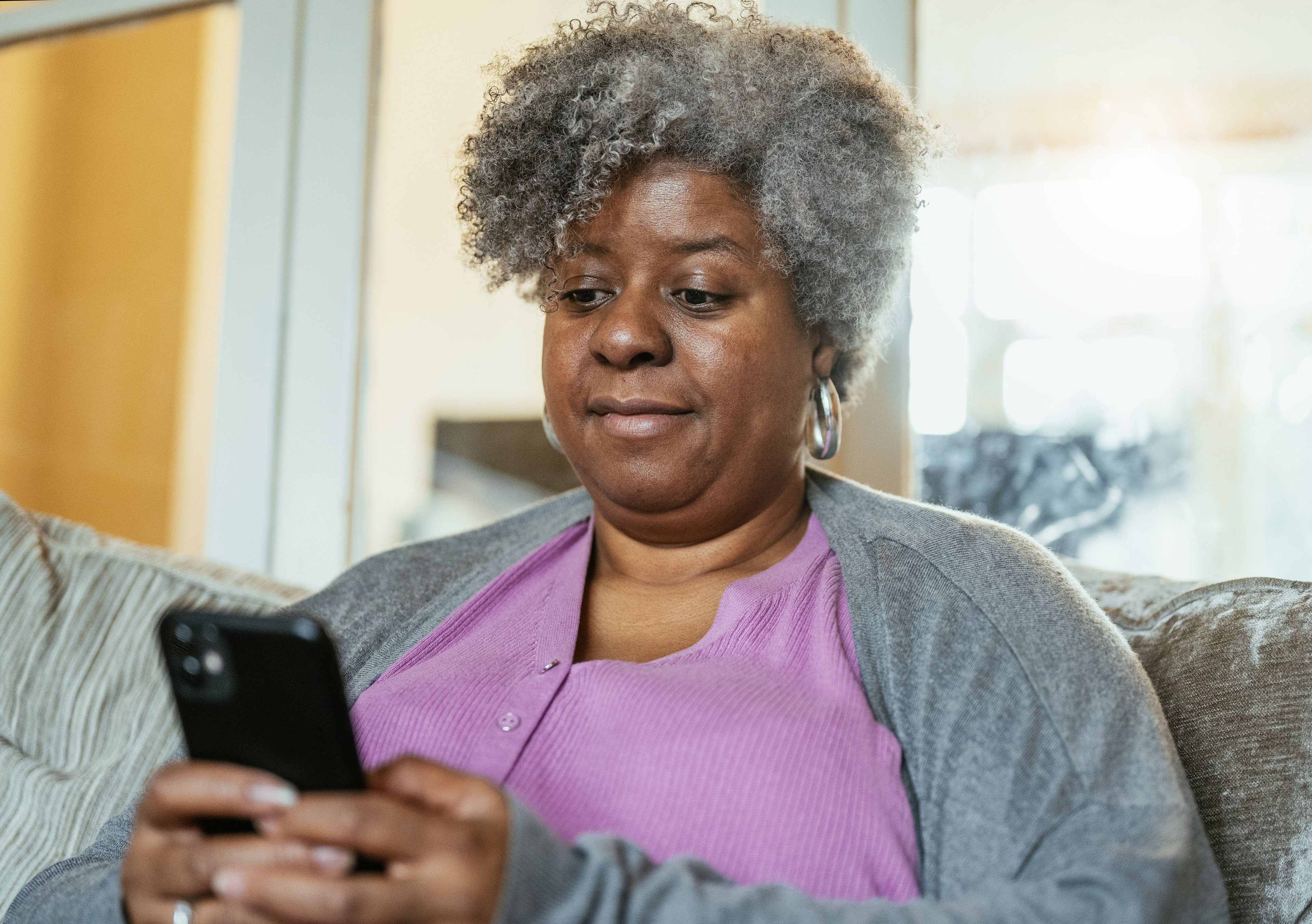 person in wheelchair using phone.jpg