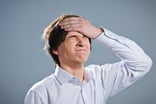 Getty - regret palm forehead slap