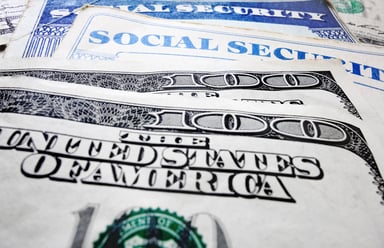 Social Security Cards and Money -- GettyImages-481424499