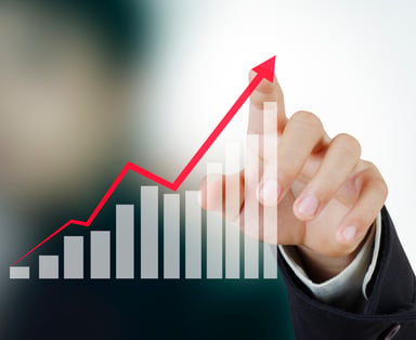 Generic Stock Market Chart Trading Up Overlaid on Hand