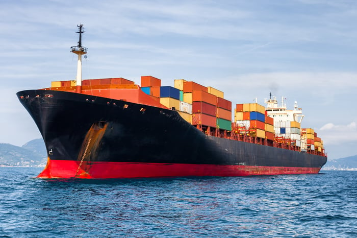 A seafaring cargo ship. 