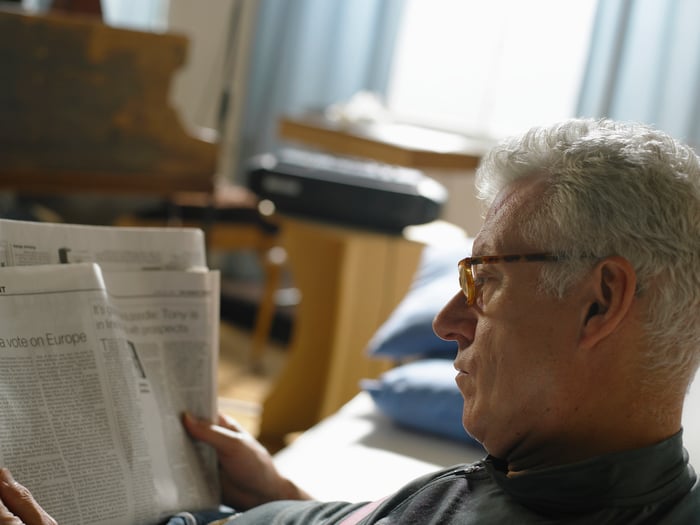 Older man reading the paper