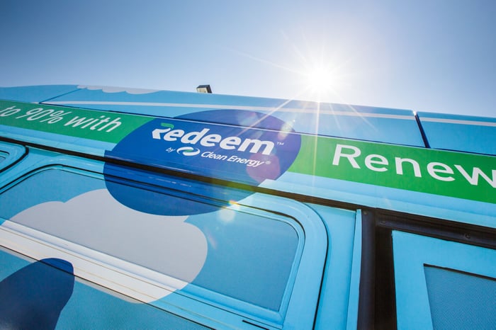 Clean Energy "Redeem" logo on the side of a transit bus