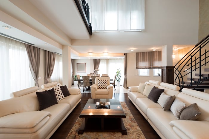 A living room filled with high-end modern furniture.