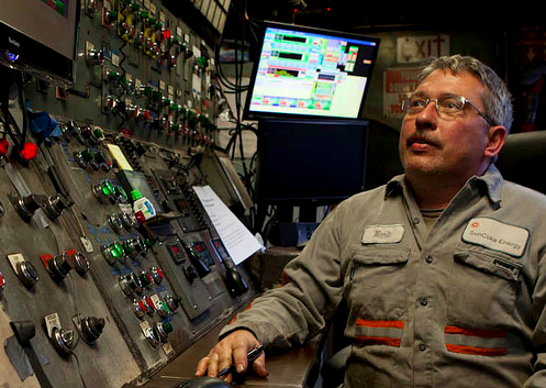 A SunCoke Energy employee at a control panel