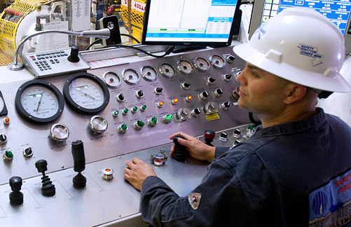 A Nabors employee in a control room.