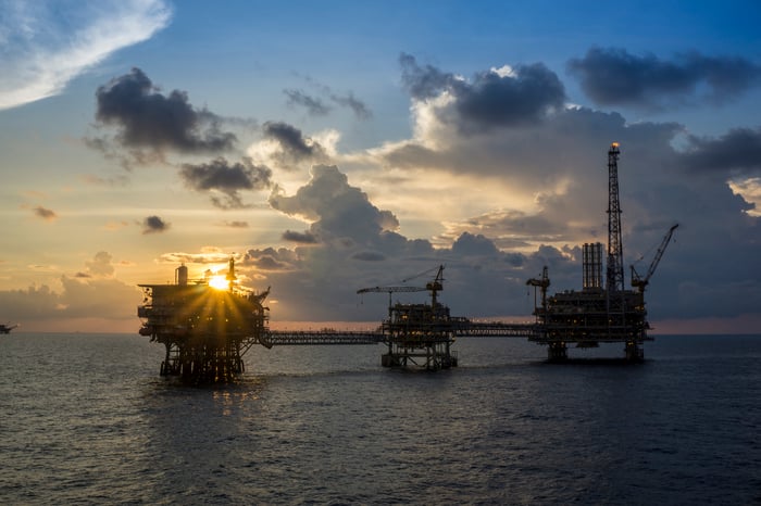 Silhouette of oil rigs or oil and gas productions platform.