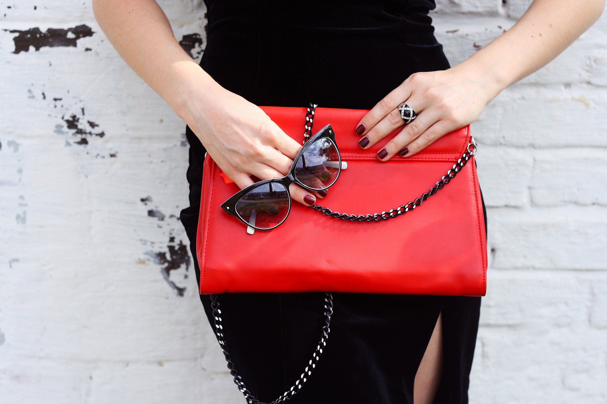 Handbag Woman Posing With Purse and Sunglasses in Hands