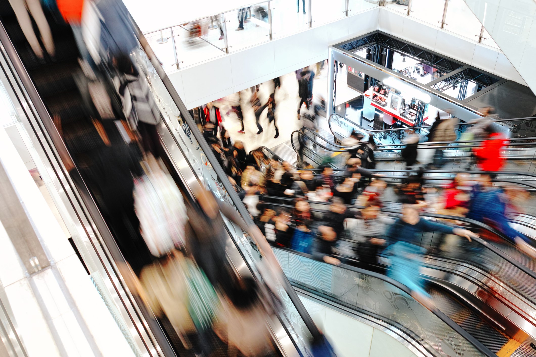 Shopping Mall People Moving Through Escalators Motion
