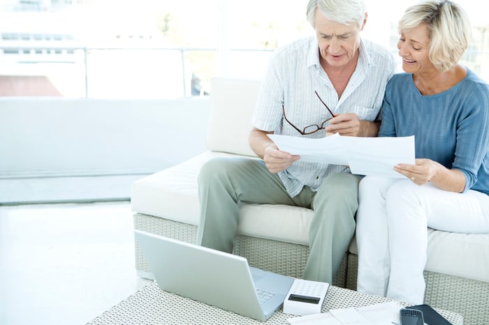 Senior couple reviewing finances