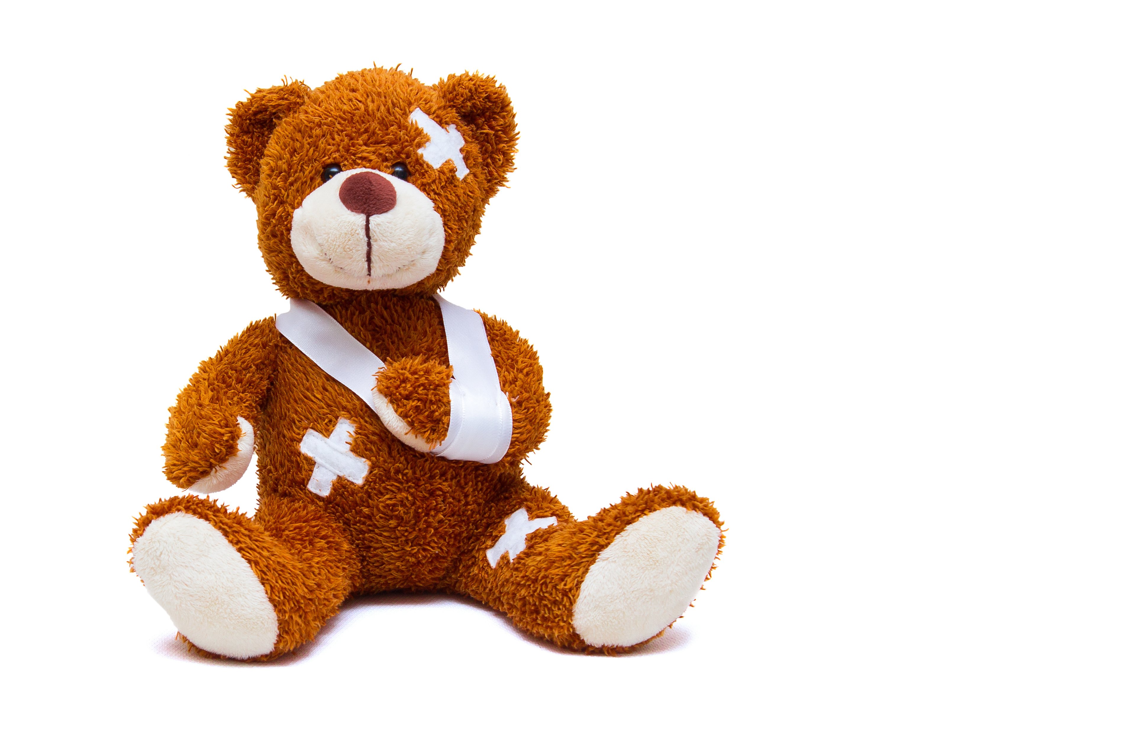 Injured Teddy Bear with sling and bandages GettyImages-589582238