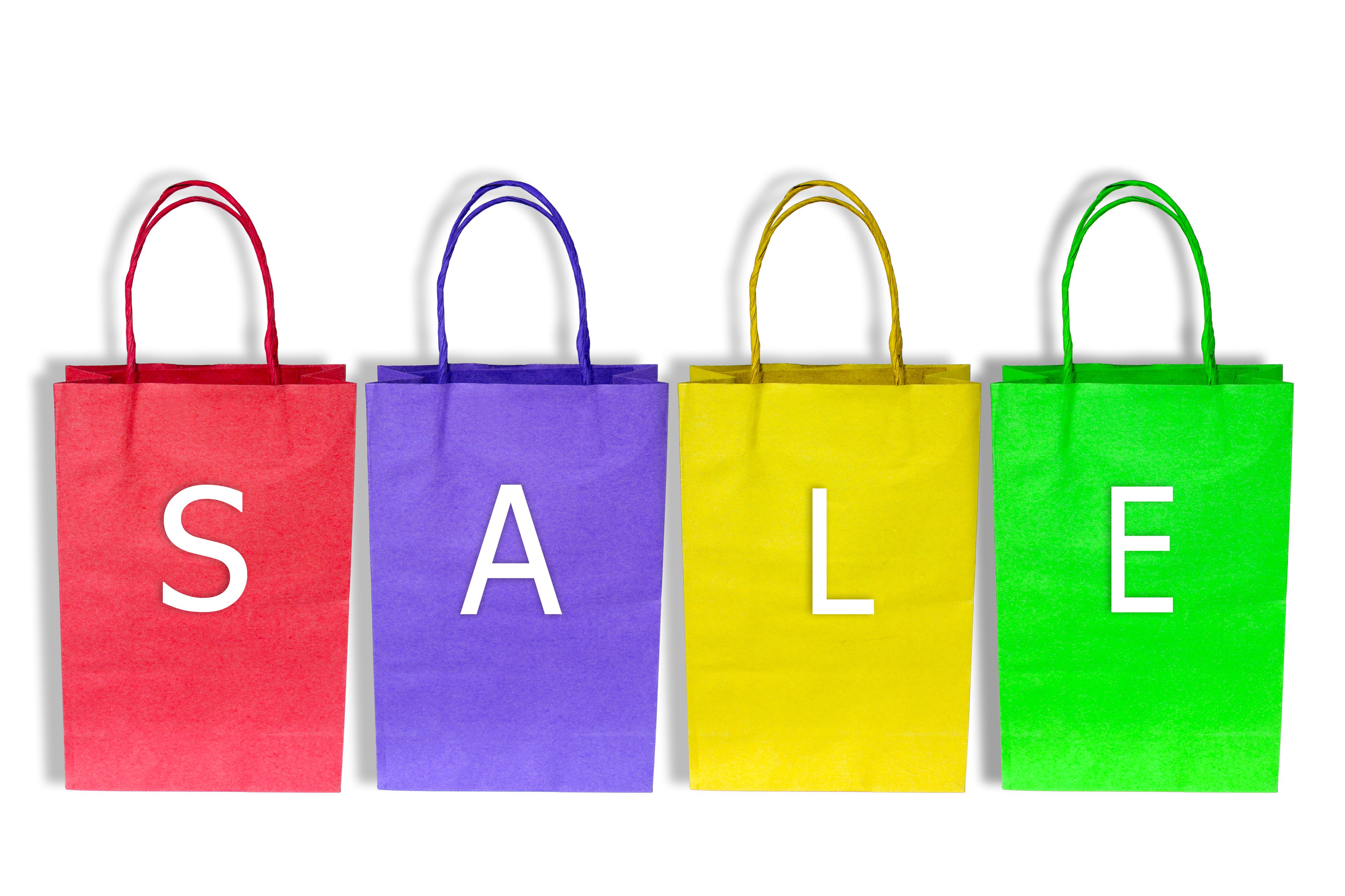Shopping bags of different colors spelling out the word sale