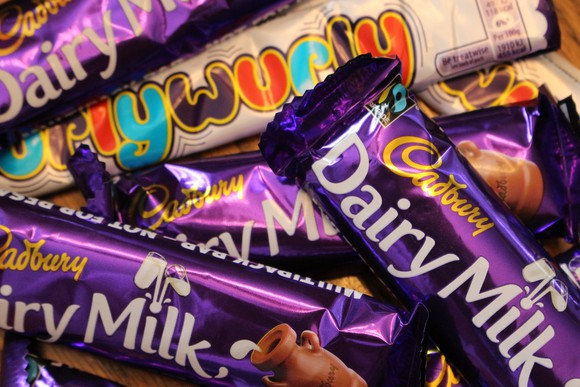 Cadbury Dairy Milk chocolate bars in purple packaging.