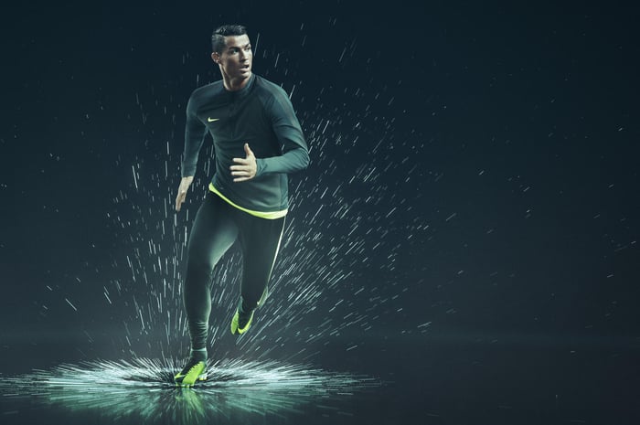 Cristiano Ronaldo running through a stylized a puddle