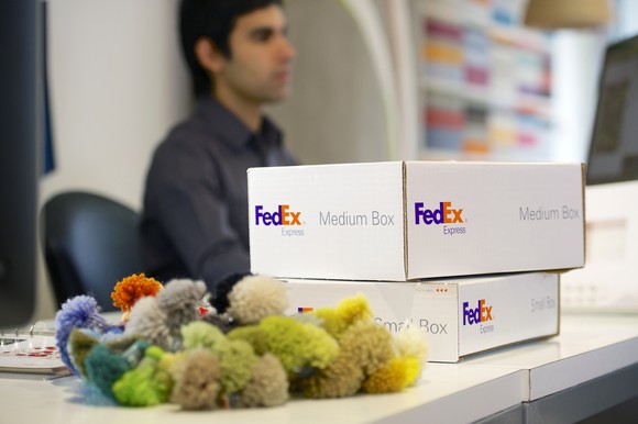 FedEx packages on a desk