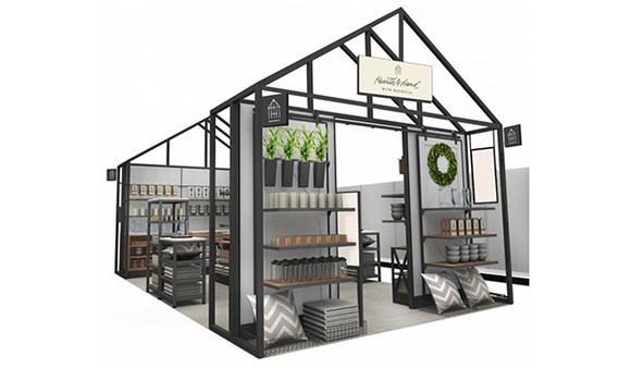 A rendering of an in-store display for the new Hearth and Hand with Magnolia brand. The display looks like a small house that shoppers can walk into and peruse various home goods and decorations.