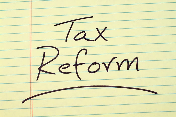 Tax reform written on a yellow legal pad