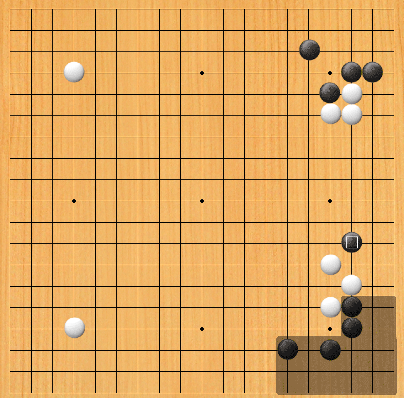 A group of white stones in the lower right is surrounded by black stones, but white surrounds territory in the center and right. Black stones interfere with that area, and a white square emerges on the lower left.