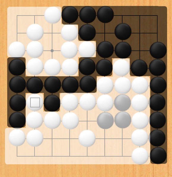 Go board with white's and black's respective territory shaded their respective colors