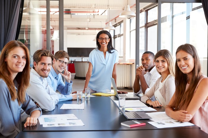 Young professionals at a conference room table