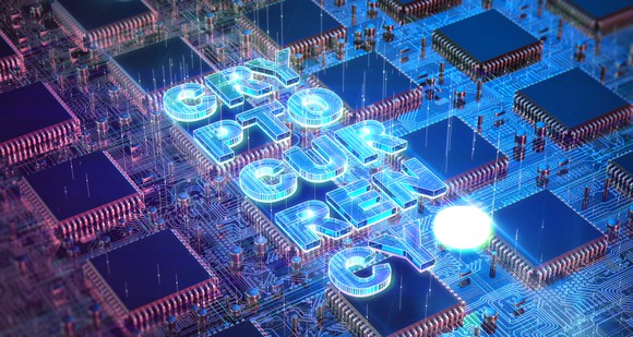 The word cryptocurrency written on semiconductor chips and circuitry.