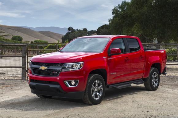 A red 2018 Chevrolet Colorado midsize pickup truck.