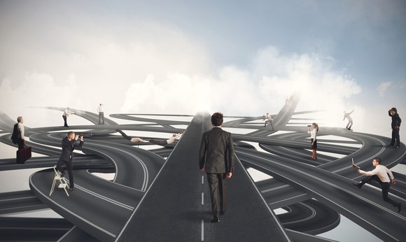 a man on a highway with various route options