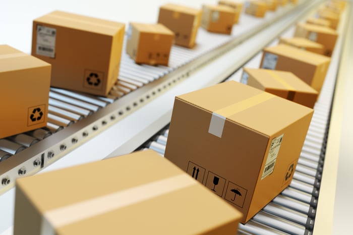 Boxes on a conveyor belt preparing to be shipped.