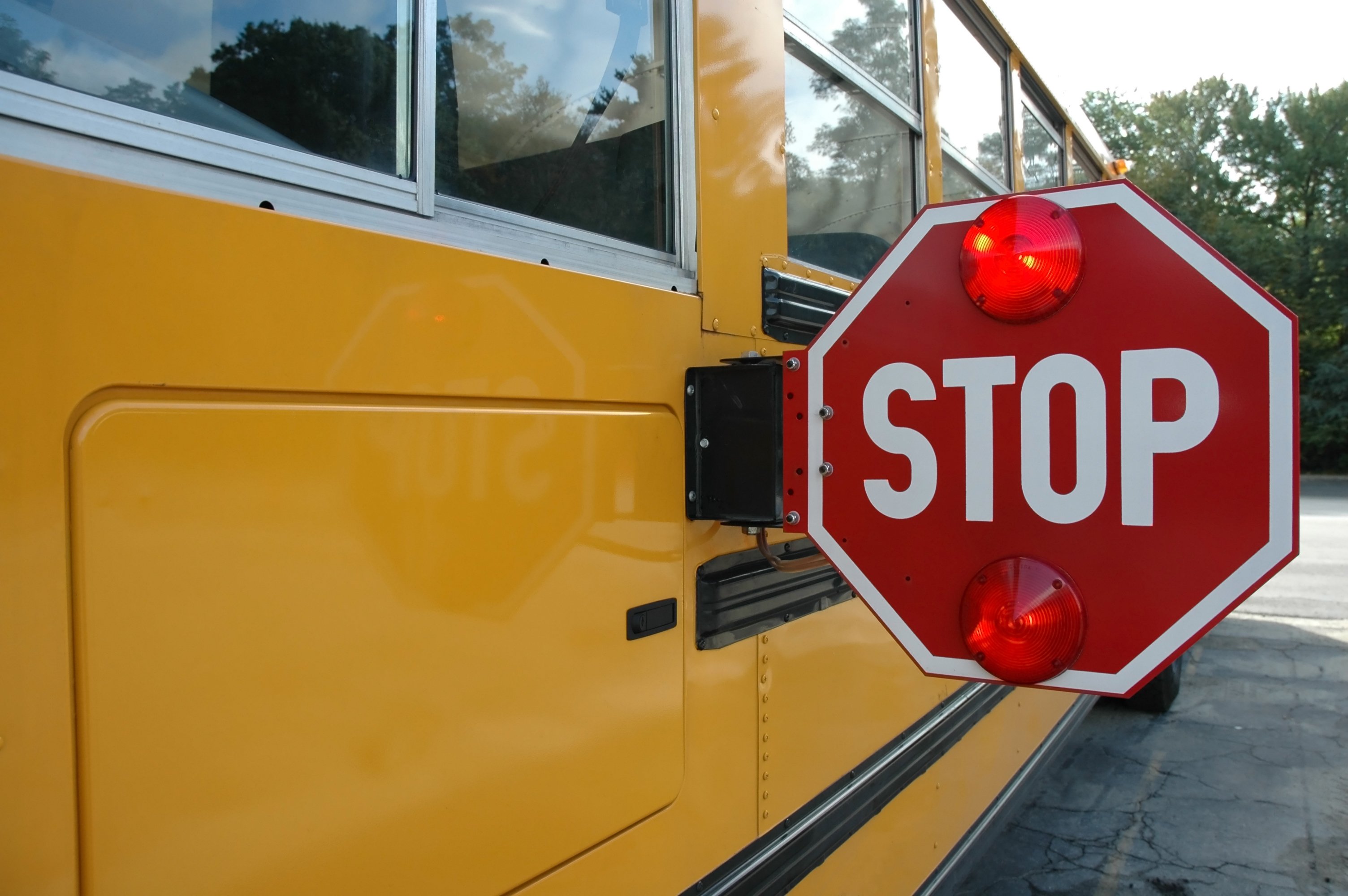 Stop Sign on a Yellow School Bus -- GettyImages-139681496