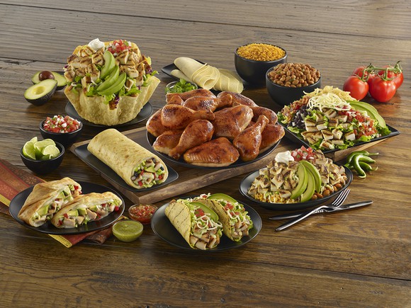 Assorted items from El Pollo Loco's core menu on wooden table.