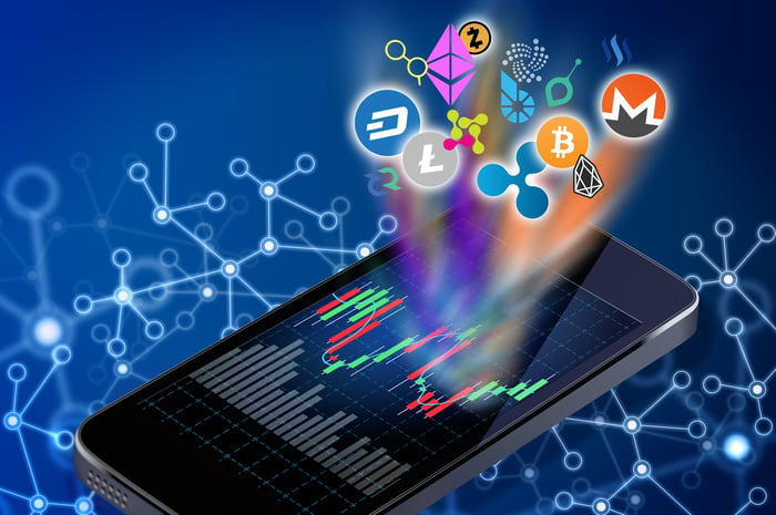 Multiple cryptocurrency logos coming out of a vacillating chart on a smartphone, surrounded by latticework representing blockchain technology.