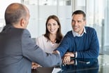 couple-meeting-with-advisor_gettyimages-842865024_large