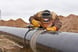 17_06_07 Oil pipeline with man welding_EPD_HEP_BPL_GettyImages-498337716