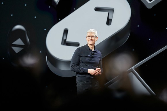 Apple CEO Tim Cook speaking onstage at WWDC 2018