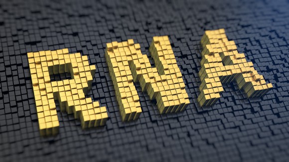 The raised yellow letters RNA against a black background