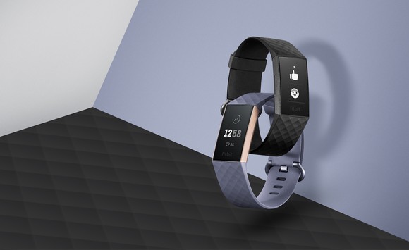 Two Fitbit Charge 3 devices