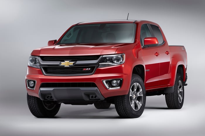 A red Chevy Colorado pickup