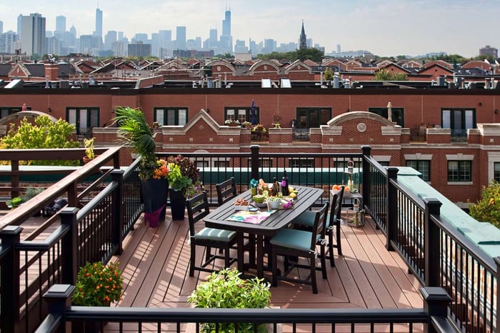 A Trex deck on a rooftop, with the Chicago skyline in the distance