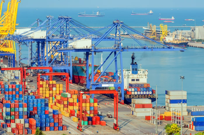 Cargo containers and cranes at a port