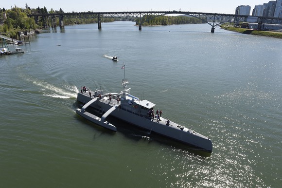 The Sea Hunter autonomous ship gets underway following its christening ceremony in Oregon.