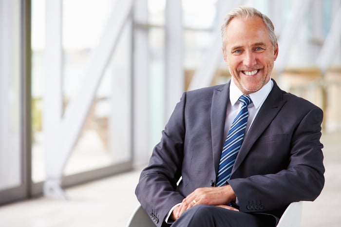 Smiling older man in business suit