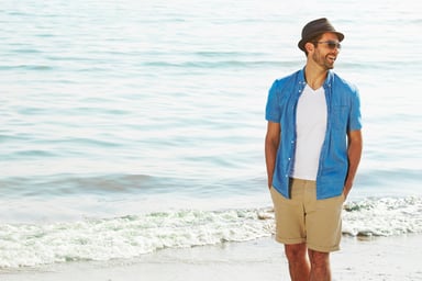 Young Man Laughing on Beach